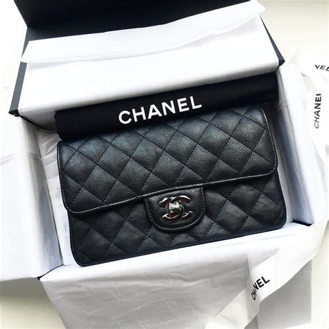 chanel black flap bag 2017|Chanel mini flap bag with top handle.